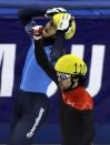 SHANGHAI, CHINA - DECEMBER 09: Charles Hamelin (R) of Canada celebrates as he defeats Vladimir Grigorev of Russia in the Men's 500m Final during the day two of the ISU World Cup Short Track at the Oriental Sports Center on December 9, 2012 in Shanghai, China. (Photo by Hong Wu/Getty Images)