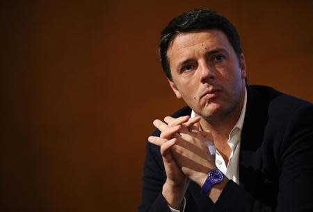 Florence mayor Matteo Renzi looks on during a political meeting in Turin December 6, 2013. REUTERS/Giorgio Perottino