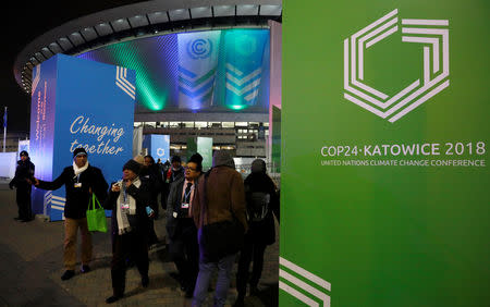 People leave the venue on the final day of the COP24 U.N. Climate Change Conference 2018 in Katowice, Poland, December 14, 2018. REUTERS/Kacper Pempel