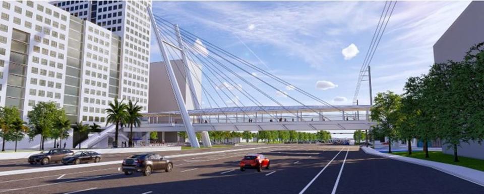 An architectural rendering depicts a planned pedestrian bridge over Southwest Eighth Street that would link Florida International University’s main campus, at right, with Sweetwater’s University City district, home to thousands of privately developed apartments dedicated to students, faculty and staff affiliated with the public institution. The new bridge would replace an earlier version that collapsed in 2018 while under construction, killing six people.