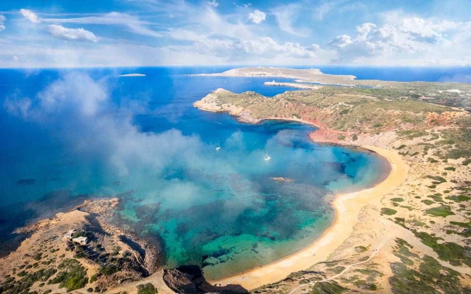 Landscape with aerial view at Platja Cavalleria, Ferragut and Cala Rotja, Menorca island, Spain - Balate Dorin/Getty Images