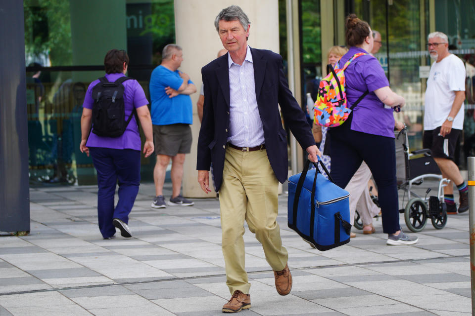 Vice Admiral Sir Tim Laurence leaves Southmead Hospital in Bristol where the Princess Royal is being treated after she 