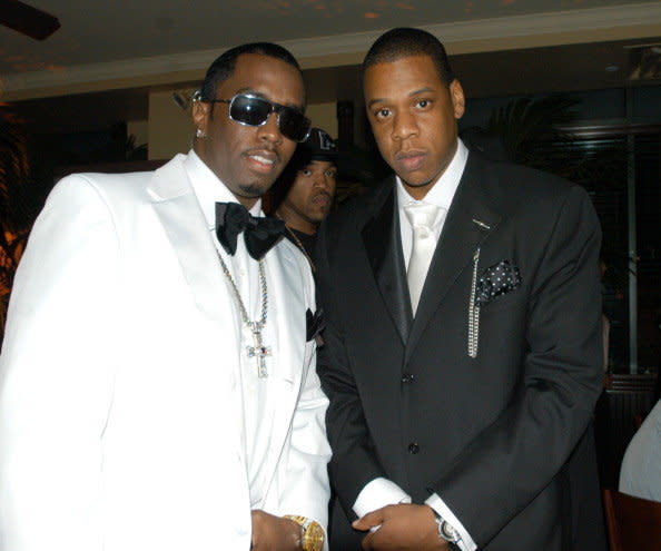 P Diddy, Jay Z during Universal Music Group's Grammy Reception at The Palm Restaurant in Los Angeles, California, United States. (Photo by Denise Truscello/WireImage for Universal Music Group) 