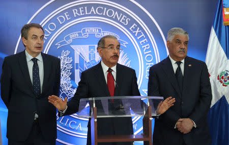 Former Spanish Prime Minister Jose Luis Rodriguez Zapatero, Dominican Republic's President Danilo Medina and Dominican Republic's Chancellor Miguel Vargas talk to the media after a meeting in Santo Domingo, Dominican Republic February 7, 2018. REUTERS/Ricardo Rojas