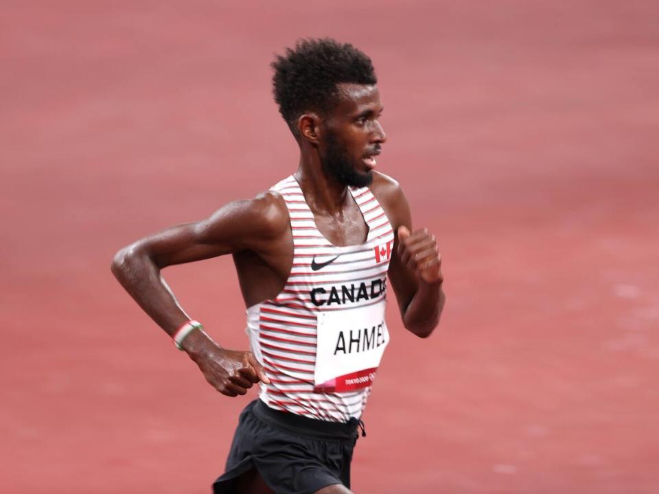 Canada's Moh Ahmed is seen competing at the Tokyo Olympics, where he became the first Canadian ever to win a long-distance track medal at the Games. (Christian Petersen/Getty Images - image credit)