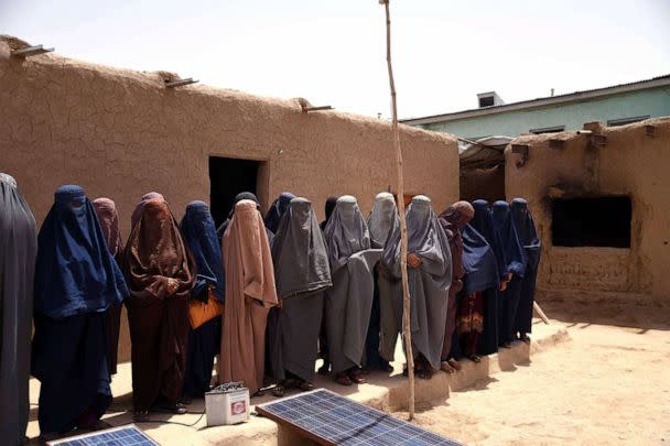 PHOTO: Afghan women work at a shampoo and soap factory in Kandahar, July 30, 2022.  (Javed Tanveer/AFP via Getty Images)