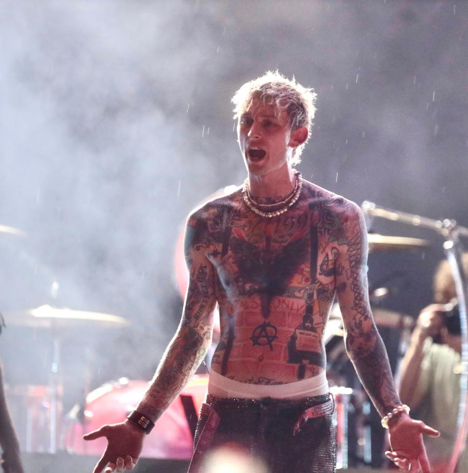 Machine Gun Kelly Tries to continue his Summer stage Central Park concert despite the officials turning off the sound system because of an approaching thunderstorm.