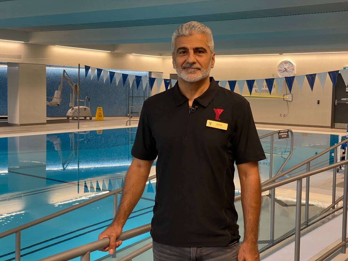 Mehdi Zobeiry is the general manager of the new Steve and Sally Stavro YMCA on Kingston Road.  (Talia Ricci/CBC News - image credit)