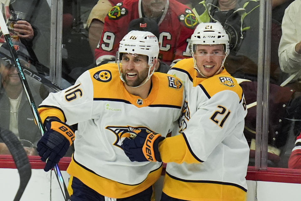 Nashville Predators left wing Jason Zucker, left, and left wing Anthony Beauvillier celebrate Zuckers goal against the Chicago Blackhawks during the second period of an NHL hockey game Friday, April 12, 2024, in Chicago. (AP Photo/Erin Hooley)