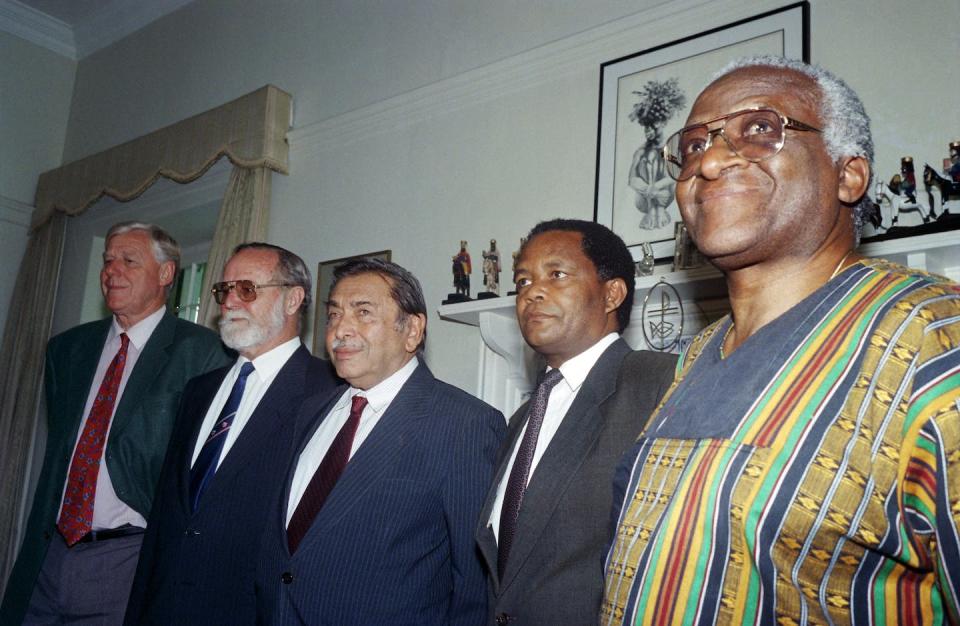 Desmond Tutu, right, served as the chairperson for South Africa’s Truth and Reconciliation Commission, as shown in 1996. <a href="https://media.gettyimages.com/photos/truth-and-reconciliation-commission-chairperson-south-african-tutu-picture-id852922322" rel="nofollow noopener" target="_blank" data-ylk="slk:Anna Zieminski/AFP via Getty Images;elm:context_link;itc:0;sec:content-canvas" class="link ">Anna Zieminski/AFP via Getty Images</a>