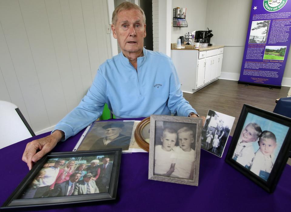 Art Shoemaker with family photos inside the Cramerton Historical Museum Monday morning, April 22, 2024.