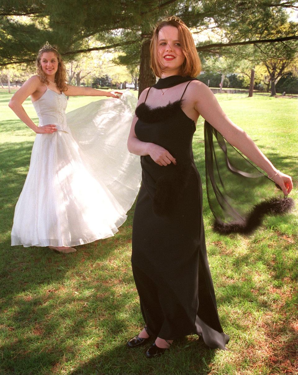 Two girls wearing prom dresses in 1998