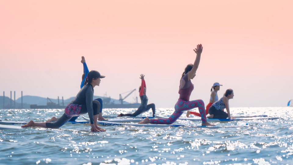 Group doing a SUP yoga class