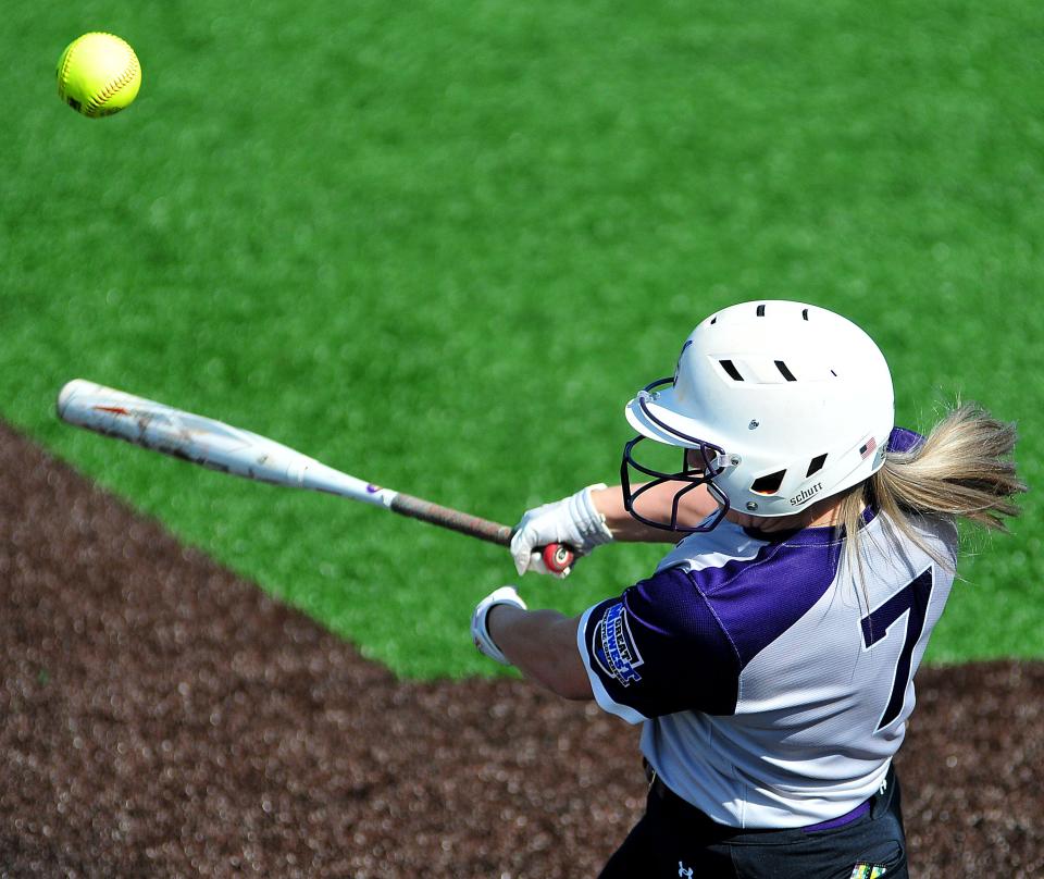 Ashland University’s Hailey Krinn (7) connects with the ball  during a softball game against Ferris State University Tuesday, April 11, 2023 at Ashland University’s Deb Miller Field at Archer Ballpark Complex.