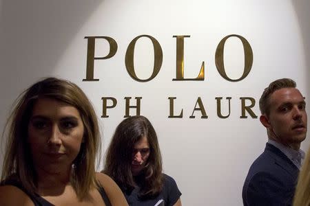 People wait to attend the Spring 2016 Polo Ralph Lauren Menâ€™s Presentation during Men's Fashion Week, in New York, July 16, 2015. REUTERS/Brendan McDermid
