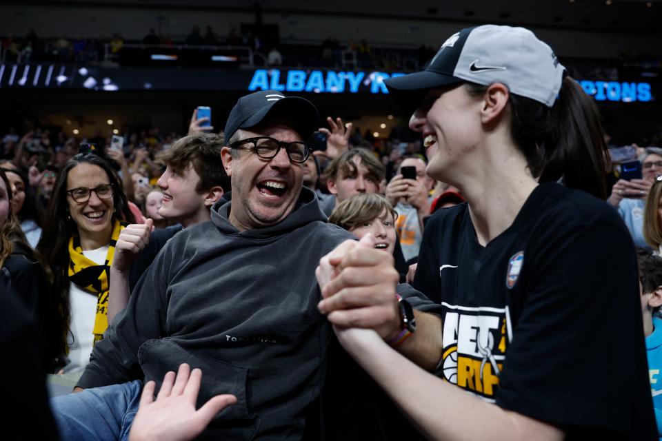 Caitlin Clark celebrates Iowa's Elite Eight win with actor Jason Sudeikis.