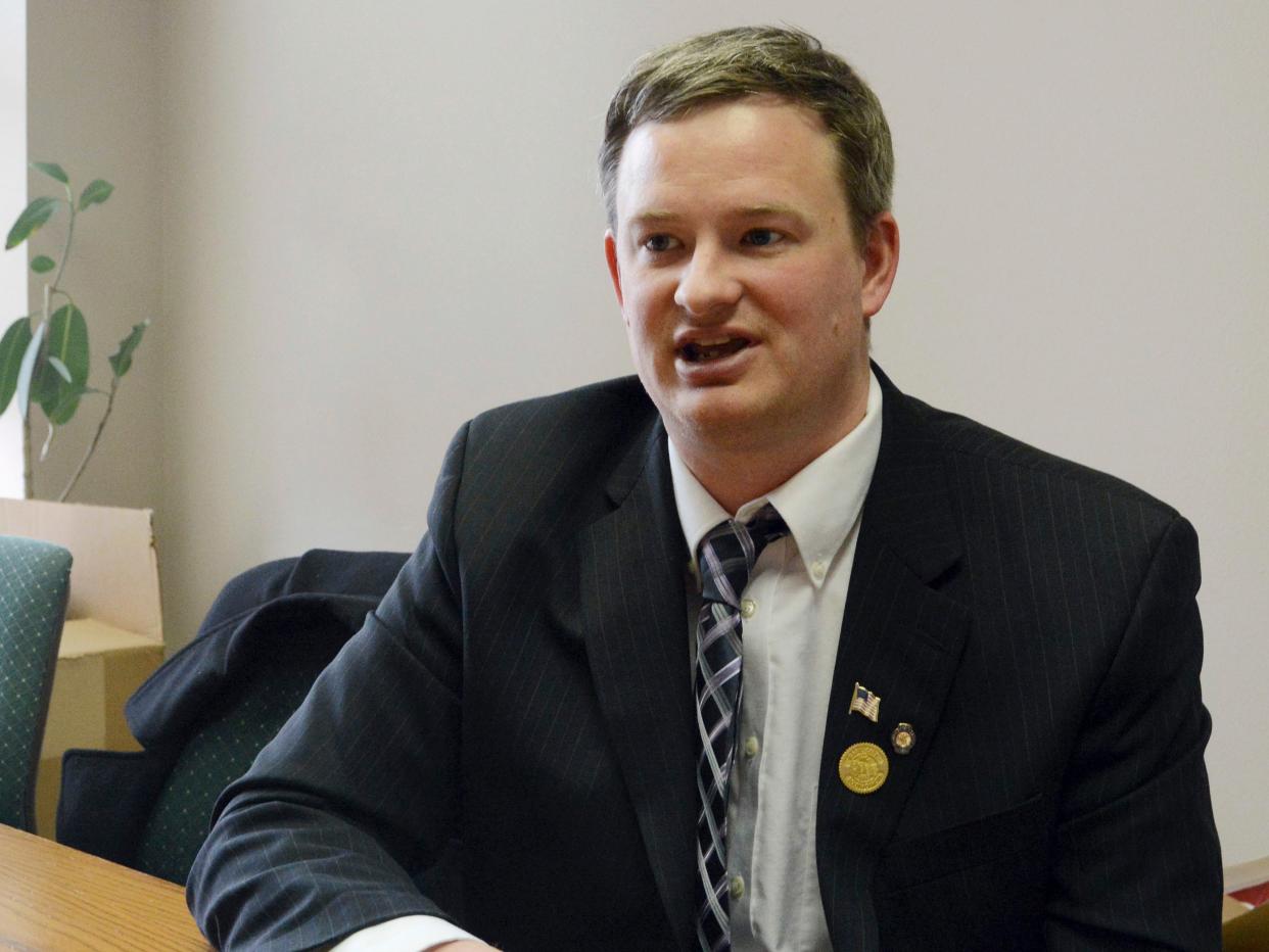 <p>Jason Ravnsborg speaks in Sioux Falls, SD Ravnsborg, South Dakota’s Republican attorney general, has been charged with misdemeanour careless driving after he struck and killed a man with his car, authorities said Thursday 18 February 2021</p> ((Associated Press))