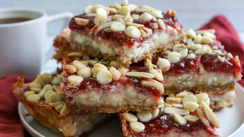 raspberry white chocolate layer bars on a plate