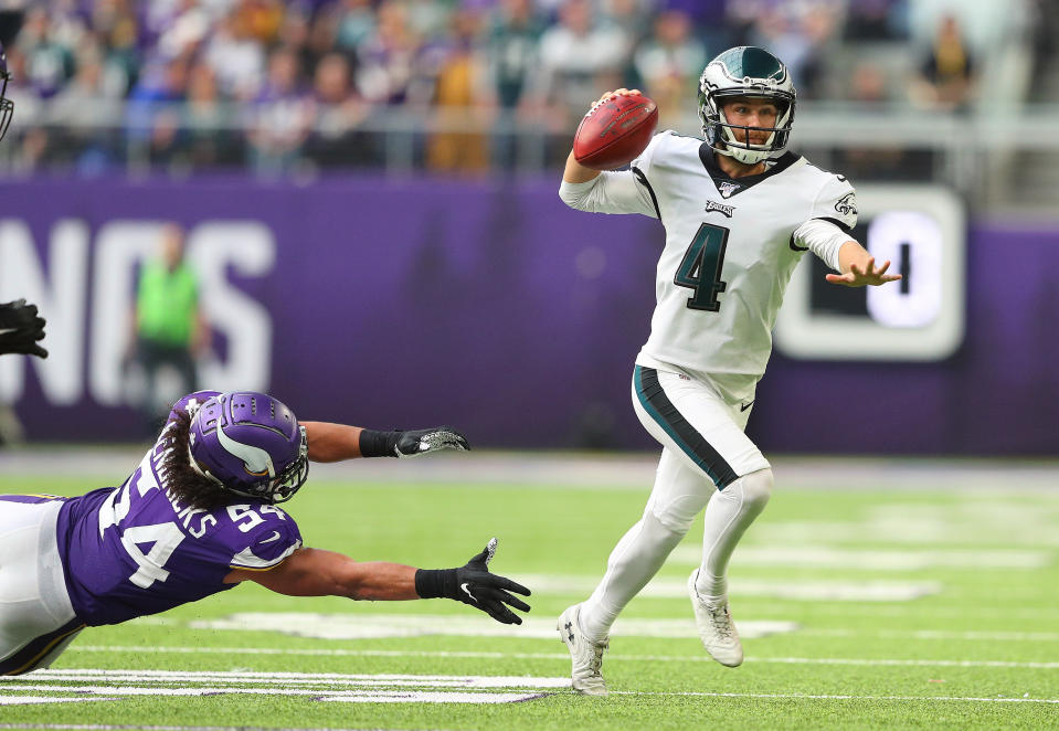 MINNEAPOLIS, MN - OCTOBER 13: Jake Elliott #4 of the Philadelphia Eagles throws an interception while Eric Kendricks #54 of the Minnesota Vikings attempts the tackle in the second quarter at U.S. Bank Stadium on October 13, 2019 in Minneapolis, Minnesota. (Photo by Adam Bettcher/Getty Images)