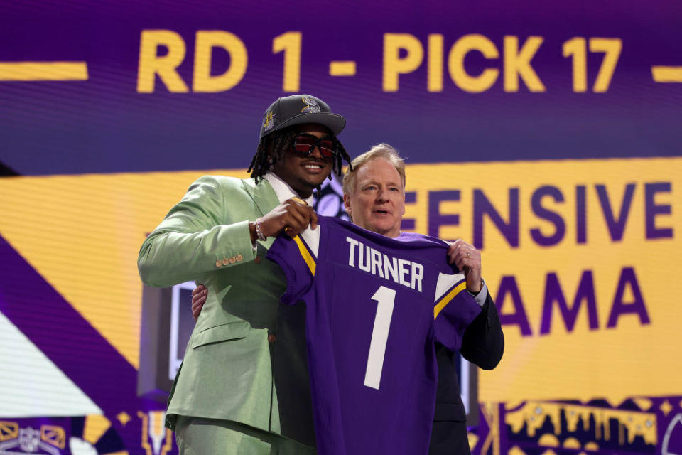 Dallas Turner poses with NFL Commissioner Roger Goodell after being selected 17th overall by the Minnesota Vikings during the first round of the 2024 NFL Draft at Campus Martius Park and Hart Plaza on April 25, 2024, in Detroit, Michigan. / Credit: Getty Images