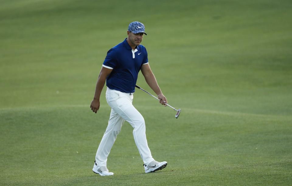 Brooks Koepka walks to the 18th green during the first round for the Masters golf tournament Thursday, April 11, 2019, in Augusta, Ga. (AP Photo/Matt Slocum)