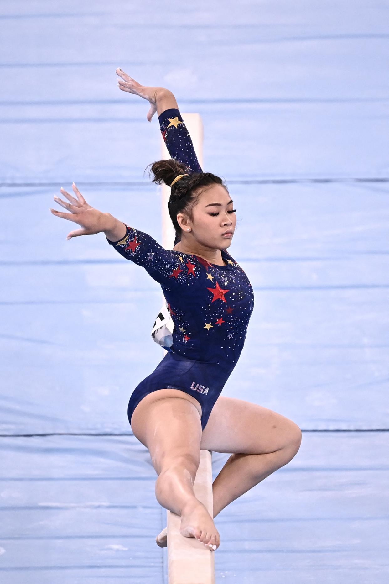 USA's Sunisa Lee competes in the artistic gymnastics balance beam event of the women's qualification during the Tokyo 2020 Olympic Games at the Ariake Gymnastics Centre in Tokyo on July 25, 2021.