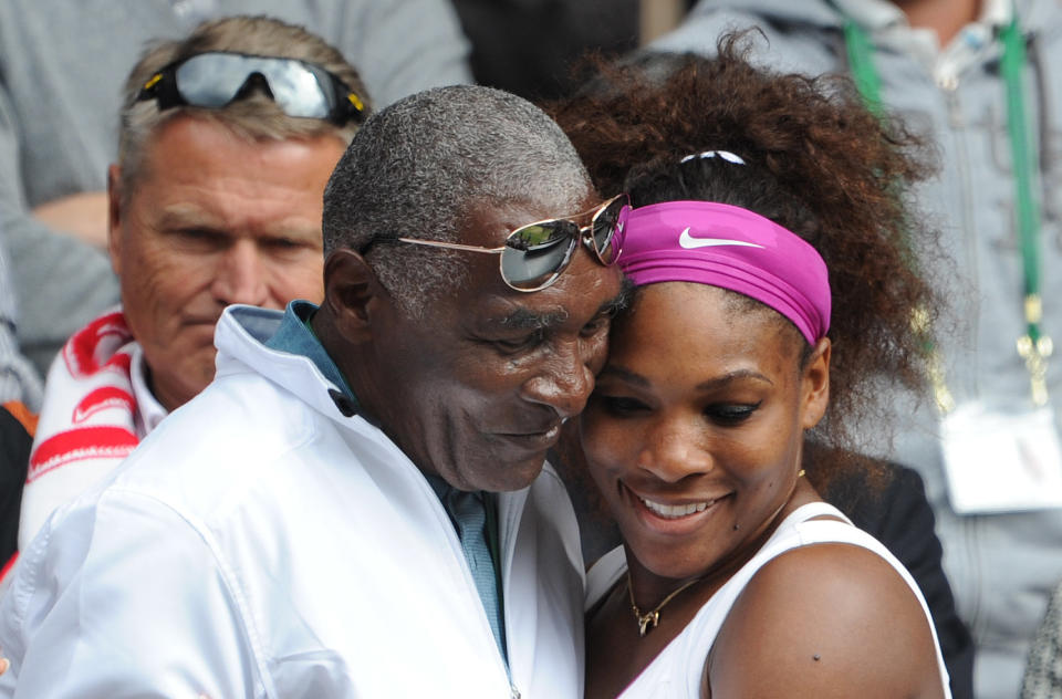 Serena Williams hugs her father, Richard Williams, after winning her Ladies Singles Final match&nbsp;at the 2012 Wimbledon Tennis Championships&nbsp;in London.&nbsp;