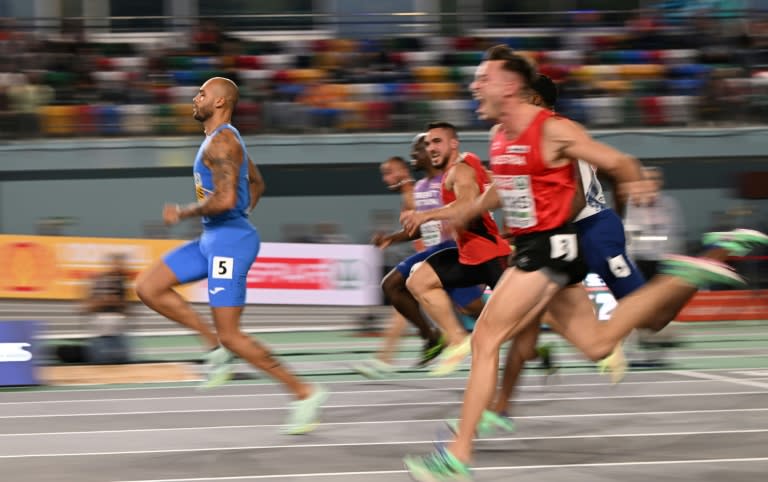 Marcell Jacobs (L) won double gold at the last Olympics in Tokyo (OZAN KOSE)