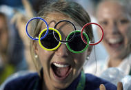 <p>Jackie Briggs from the United States wears the Olympic ring sunglasses during the closing ceremony in the Maracana stadium at the 2016 Summer Olympics in Rio de Janeiro, Brazil, Sunday, Aug. 21, 2016. (AP Photo/David Goldman) </p>