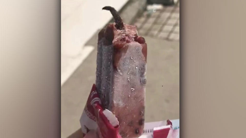 The female customer was left traumatised to find a rat’s tail poking out of her ice block. Source: Miaopai/ Btime