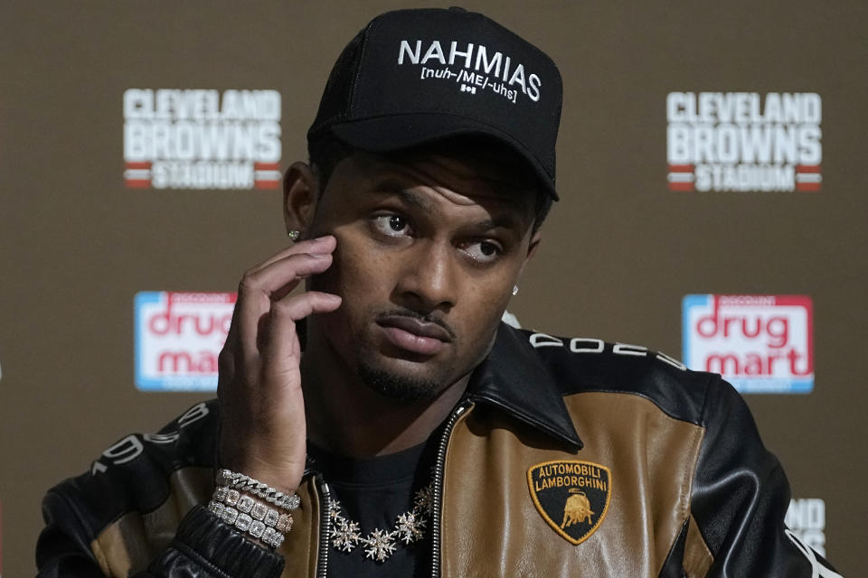 FILE - Cleveland Browns quarterback Deshaun Watson speaks to reporters after an NFL football game against the Arizona Cardinals Sunday, Nov. 5, 2023, in Cleveland. Women are reshaping America's most popular sport, which has made major strides in gender equity while also showing — with Washington's toxic workplace culture that led to owner Dan Snyder's ouster and Cleveland's signing of quarterback Deshaun Watson amid sexual assault allegations as two examples — that more work needs to be done.(AP Photo/Sue Ogrocki, File)