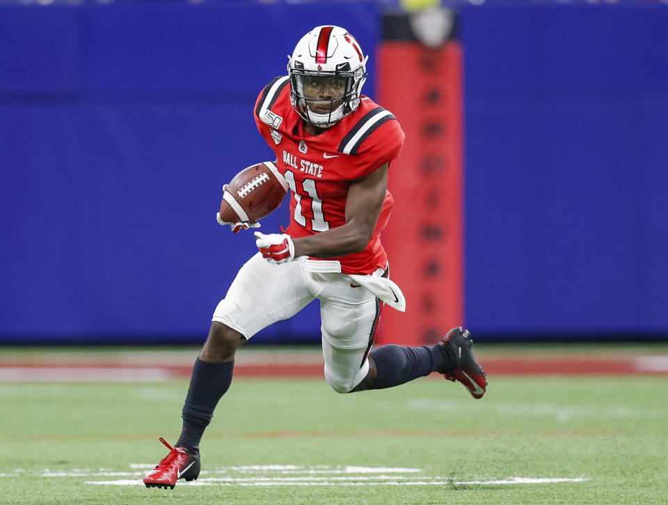 INDIANAPOLIS, IN - AUGUST 31: Justin Hall #11 of the Ball State Cardinals runs the ball during the first half against the Indiana Hoosiers at Lucas Oil Stadium on August 31, 2019 in Indianapolis, Indiana. (Photo by Michael Hickey/Getty Images)