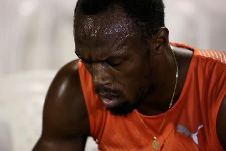 Athletics - Jamaica National Trials - Kingston - 30/06/16 Winner Usain Bolt of Jamaica upset after his quarter final 100m race. REUTERS/Gilbert Bellamy