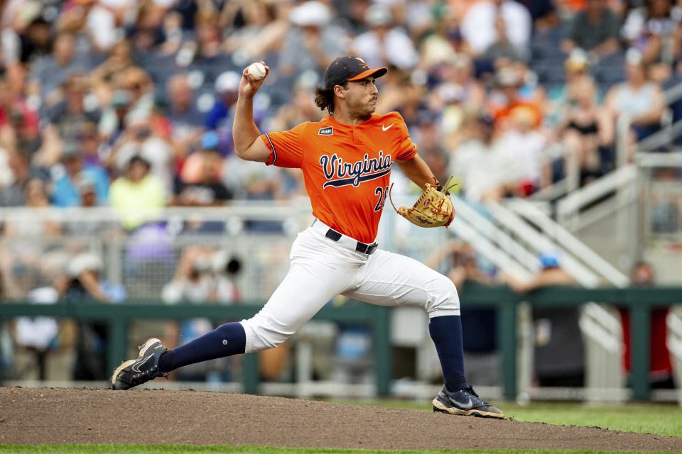 Virginia pitcher Nick Parker throws against Florida in the first inning of a baseball game at the NCAA College World Series in Omaha, Neb., Friday, June 16, 2023. (AP Photo/John Peterson)