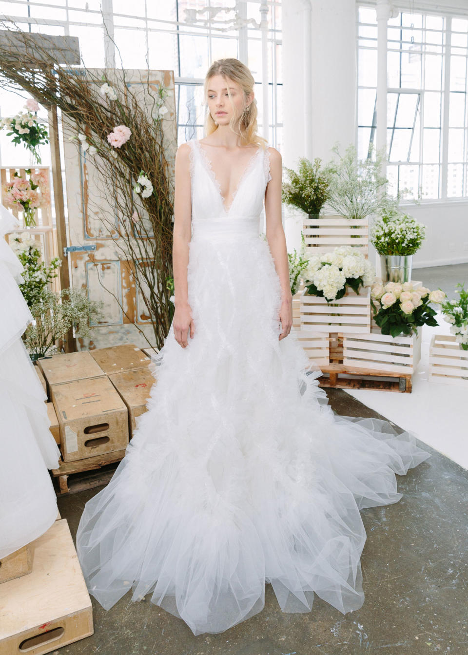 <p>V-neck cut gown with major tulle volume. (Photo: Marchesa Notte) </p>