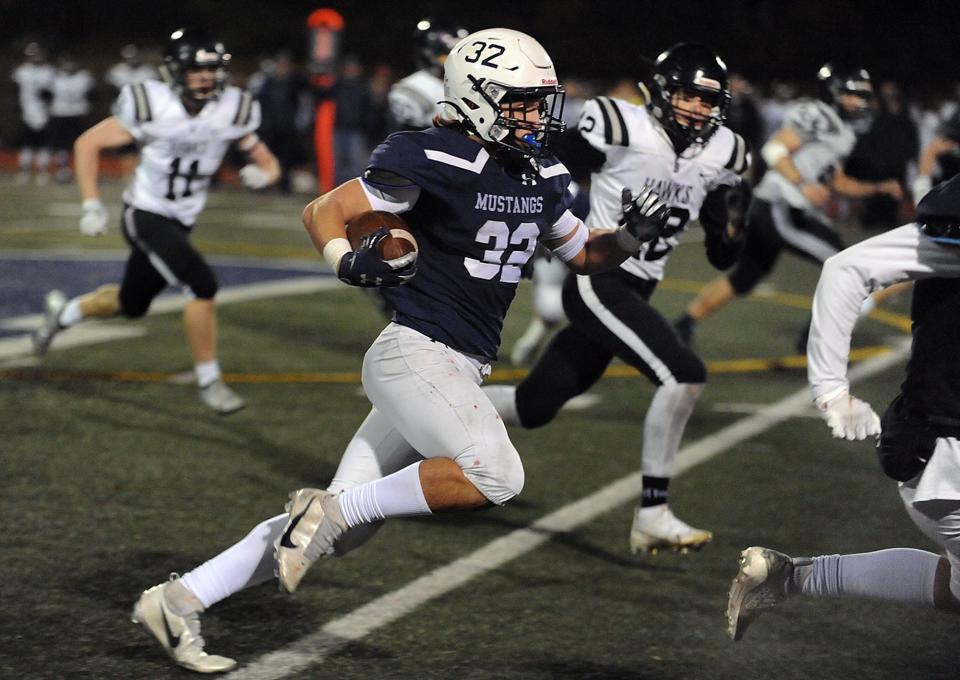 Former Medway High football player Matt Childs, now at Milton Academy, during a Division 6 playoff game on Nov. 5, 2021.