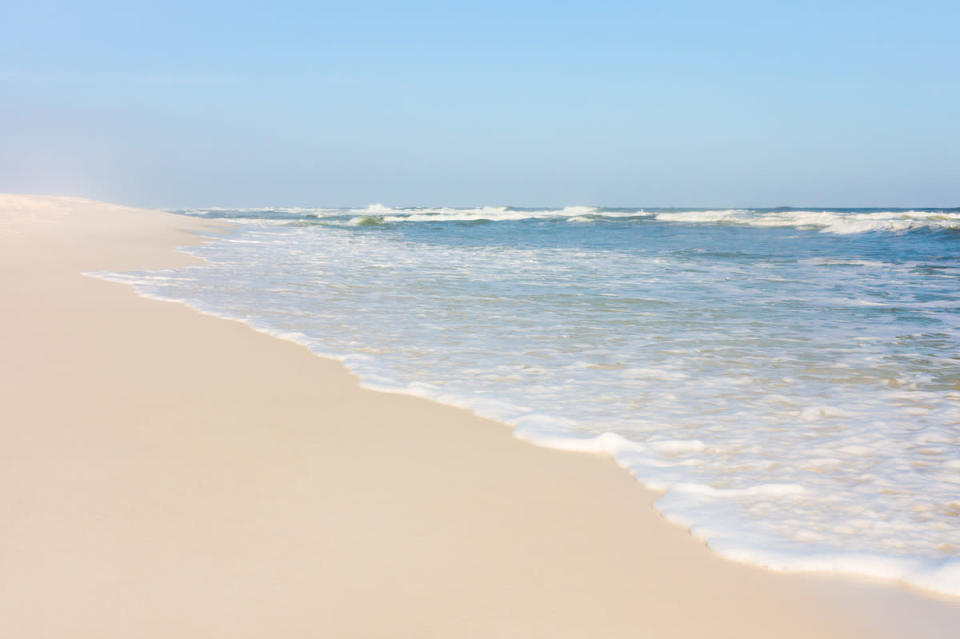 <p>New Smyrna Beach in Florida has the dubious honour of having more shark attacks annually than any other beach. The beach is part of Volusia County, which accounts for roughly 37% of Florida’s 663 attacks since 1882. </p>

<p>It is estimated that anyone who has swam there has been within 10ft of a shark, according to <a href="http://natgeotv.com/ca/human-shark-bait/facts">National Geographic</a>. However, there have never been any fatalities on New Smyrna.</p>

<p>However, that can't be said for the rest of Florida. Since 1988, there have been 6 fatalities.</p>