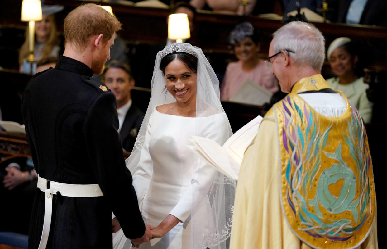 WINDSOR, UNITED KINGDOM - MAY 19:  Prince Harry and Meghan Markle during their wedding service, conducted by the Archbishop of Canterbury Justin Welby in St George's Chapel at Windsor Castle on May 19, 2018 in Windsor, England. (Photo by Dominic Lipinski - WPA Pool/Getty Images)