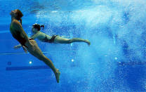 LONDON, ENGLAND - JULY 29: Anabelle Smith and Sharleen Stratton of Australia compete in the Women's Syncronised 3m Springboard during the 2012 London Olympics at the Aquatics Centre on July 29, 2012 in London, England. (Photo by Ian MacNicol/Getty Images)