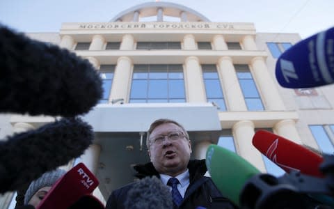 Mr Zherebenkov speaks outside Moscow city court on Tuesday - Credit: Maxim Shemetov/Reuters