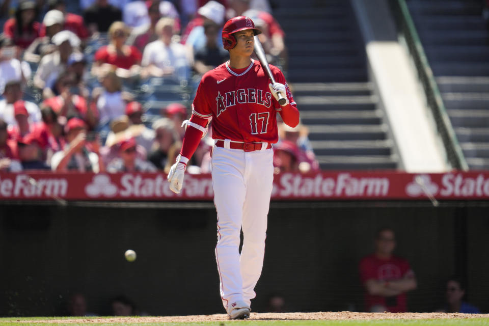 Los Angeles Angels designated hitter Shohei Ohtani (17) stands near home plate during the seventh inning of a baseball game against the Chicago White Sox in Anaheim, Calif., Thursday, June 29, 2023. (AP Photo/Ashley Landis)