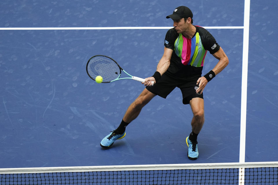 Matthew Ebden, of Australia, returns a shot at the net during the men's doubles final, of the U.S. Open tennis championships, Friday, Sept. 8, 2023, in New York. (AP Photo/Frank Franklin II)