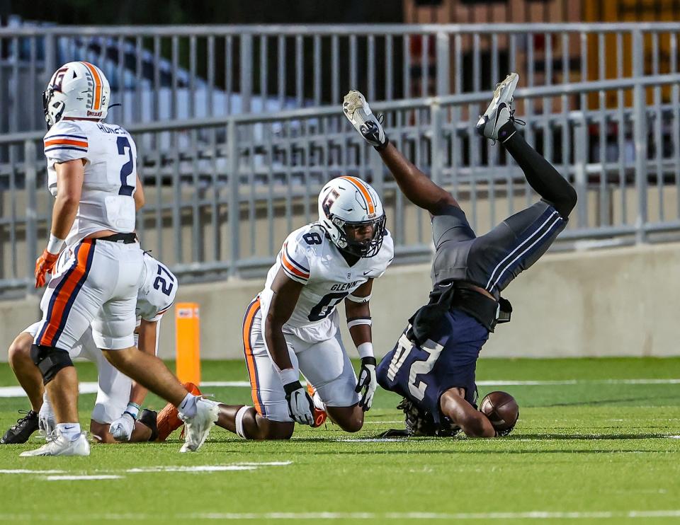 Hendrickson running back Carson Workman appears to have landed on his head after a tackle by Glenn's Jordan Thompson last week. But Workman said he just used his own momentum to roll on his head to regain his balance. Many of their friends thought the collision was far worse than it really was, they said.