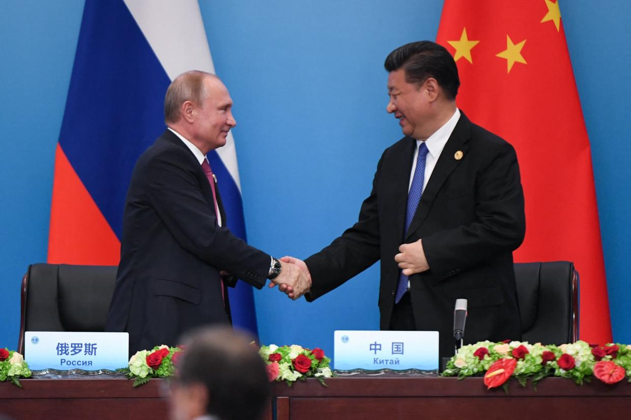 Vladimir Poutine et Xi Jinping, le 10 juin 2018 - Wang Zhao - AFP