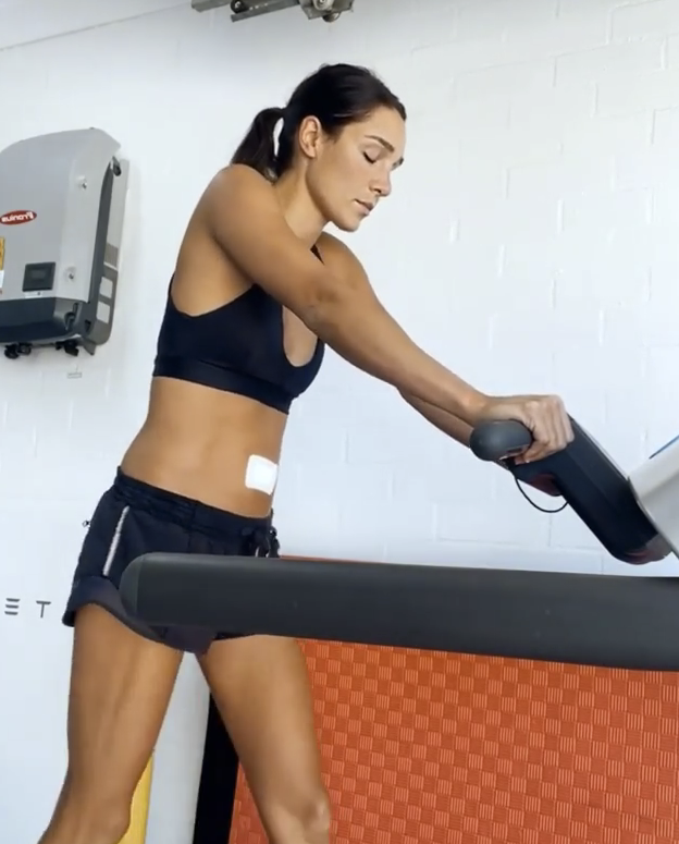 Kayla itsines doing some light walking on the treadmill after surgery