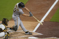 Pittsburgh Pirates' Bryan Reynolds hits an RBI double during the third inning of a baseball game against the San Diego Padres, Tuesday, May 4, 2021, in San Diego. (AP Photo/Gregory Bull)