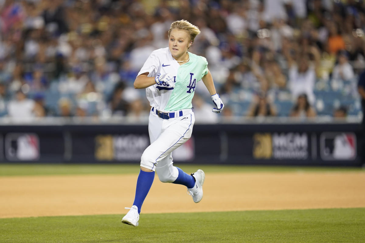 L-R) Hannah Stocking and JoJo Siwa at the 2022 MLB All-Star Celebrity  Softball Game Media Availability held at the 76 Station - Dodger Stadium  Parking Lot in Los Angeles, CA on Saturday, ?