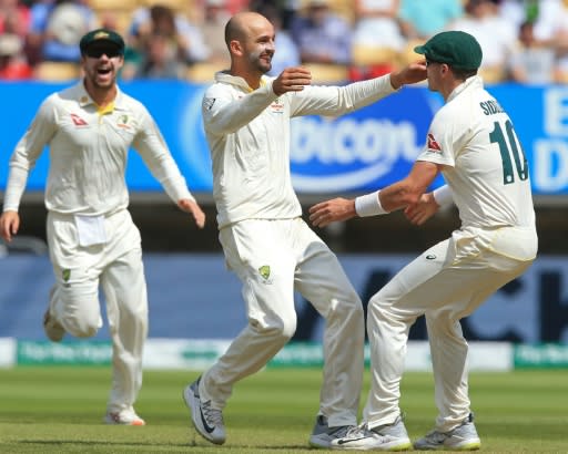 Australia's Nathan Lyon (centre) celebrates his dismissal of Joe Root in England's second innings of the first Ashes Test at Edgbaston