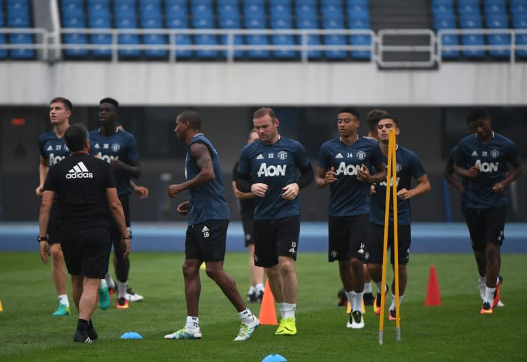 Manchester United players take part in a training session in Beijing, on July 24, 2016