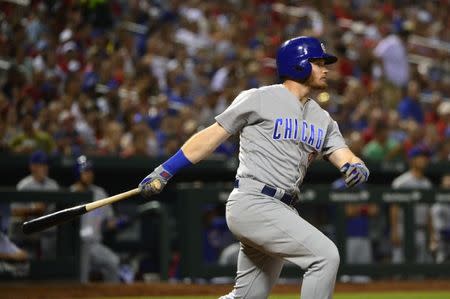 Jun 16, 2018; St. Louis, MO, USA; Chicago Cubs center fielder Ian Happ (8) hits a one run double against St. Louis Cardinals relief pitcher Sam Tuivailala (not pictured) during the seventh inning at Busch Stadium. Mandatory Credit: Jeff Curry-USA TODAY Sports